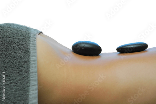Girls back with hot stones. Part of hot stones massage.