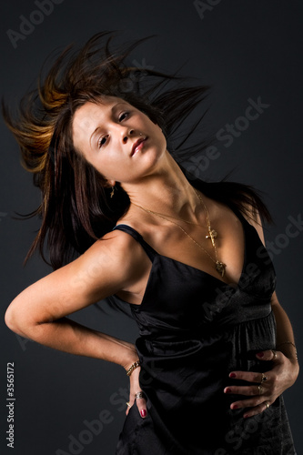 Young beautiful model flicking her hair