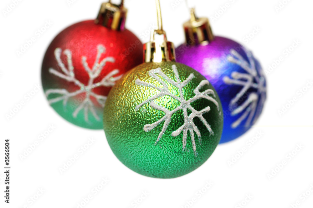 Three Christmas balls hanging - isolated on white Three Christmas balls hanging - isolated on white