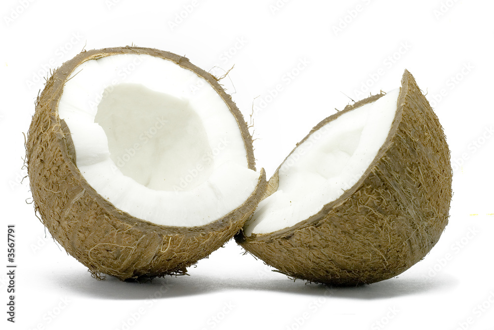Two half of coconut isolated on white Two half of coconut isolated on white