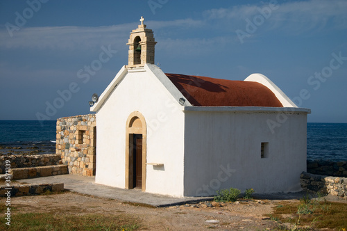 old church on the seaside in greece photo