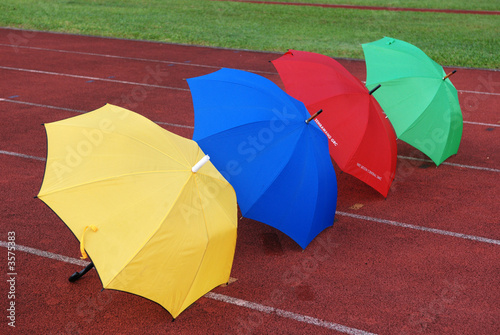 Colorful umbrellas on the running tracks