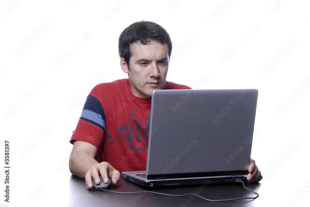 young man working with his personal computer young man working with his personal computer