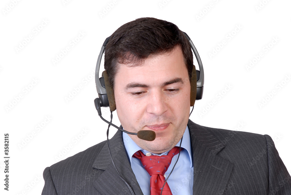 young call center man talking by the phone young call center man talking by the phone