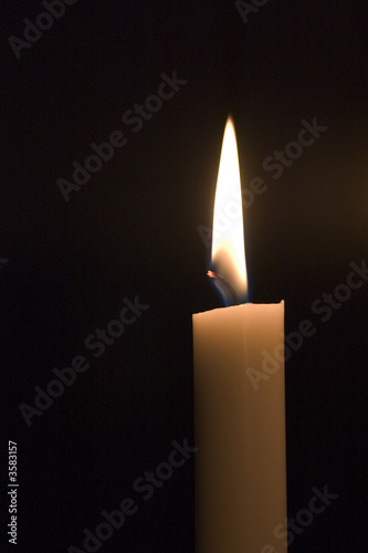 candlelight of one burning candle