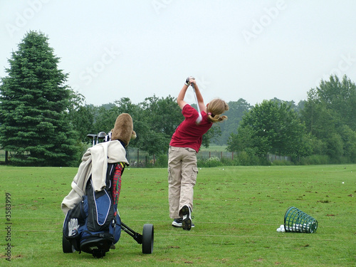 Young female golfer