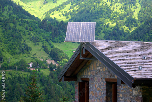 Photovoltaic panels on a log cabin