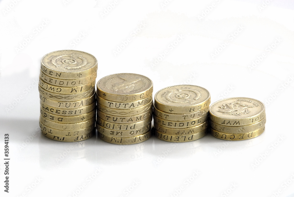 Piles of English one pound coins arranged to represent a graph. Piles of English one pound coins arranged to represent a graph.