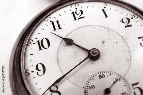 Antique pocket watch - closeup on very old pocket watch