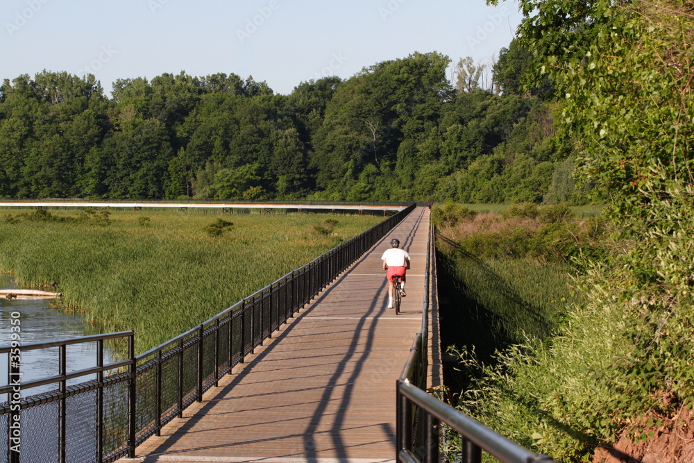 Biking on the board walk Biking on the board walk
