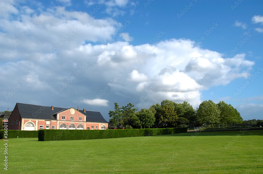 A rural summer scene in belgium with country house, A rural summer scene in belgium with country house,
