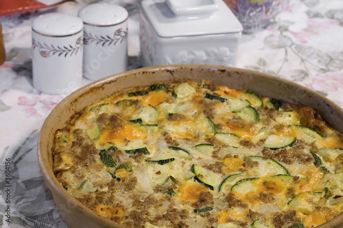 Zucchini Casserole made with Sausage, Cheese, and Onions.