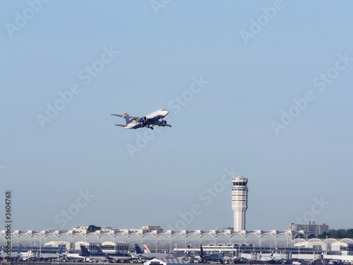 commercial jet in flight just after takeoff 2 with copy space photo