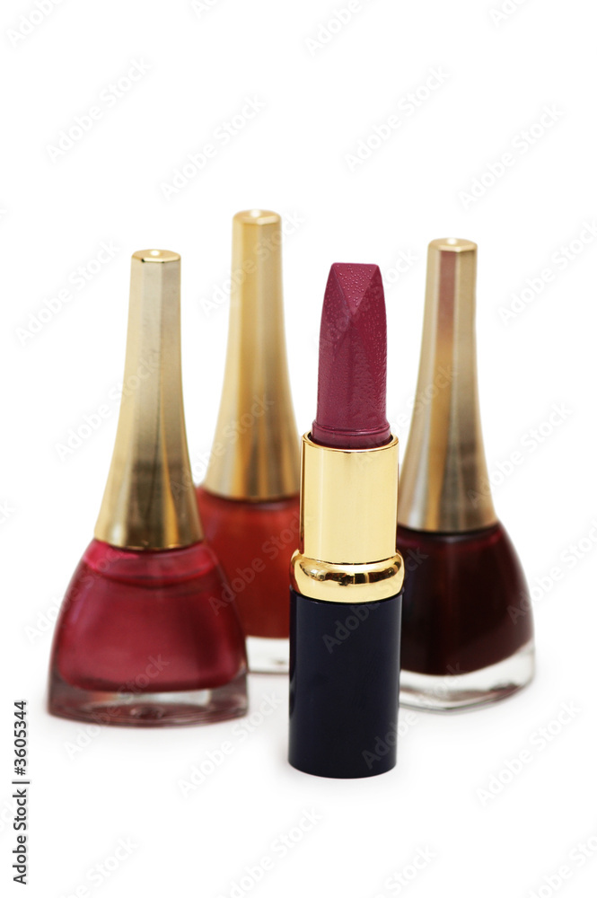 Lipstick and nail polish isolated on white Lipstick and nail polish isolated on white