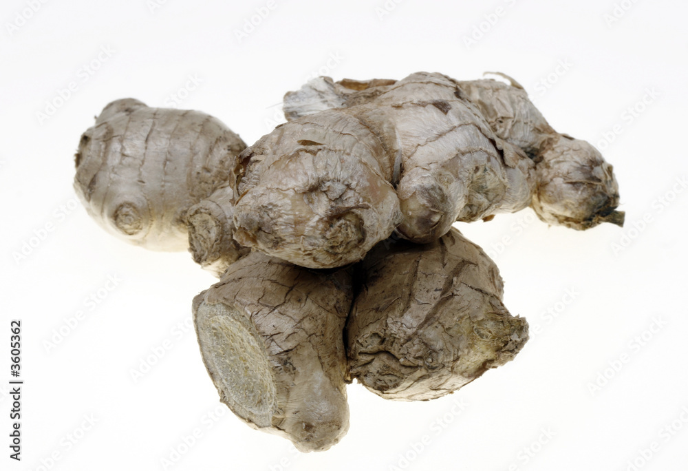 Raw ginger against white background Raw ginger against white background