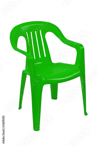 green plastic chair on white