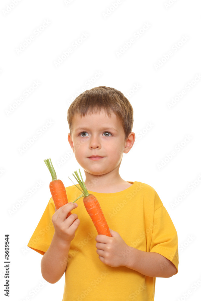 five years old boy eating fresh carrot isolated on white five years old boy eating fresh carrot isolated on white