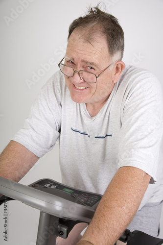 Big making the best of it working out on a bike