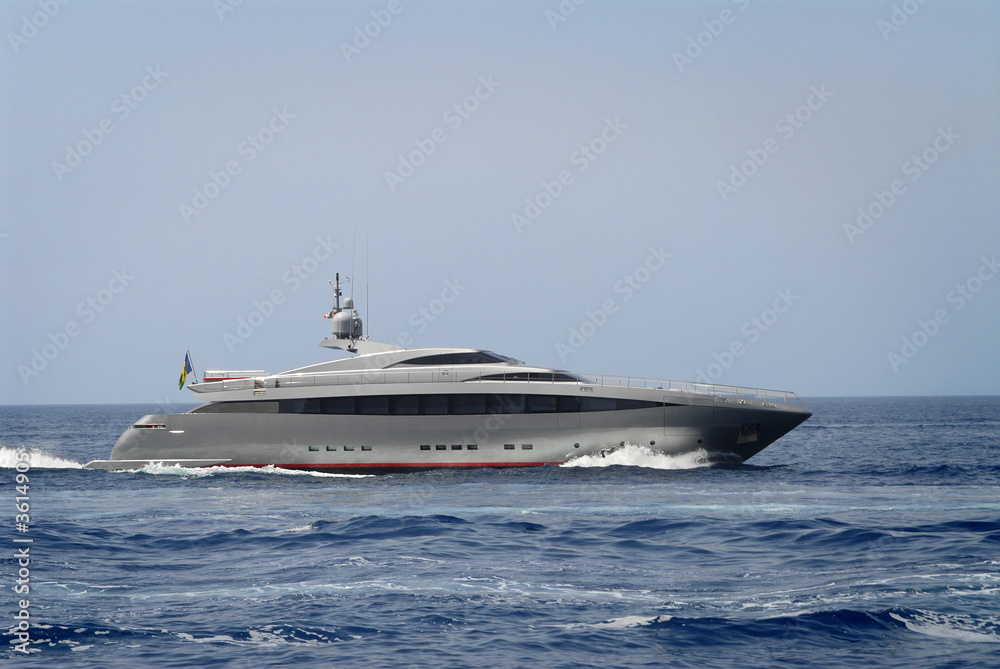 beautiful silver luxury yacht off the Island of Capri beautiful silver luxury yacht off the Island of Capri