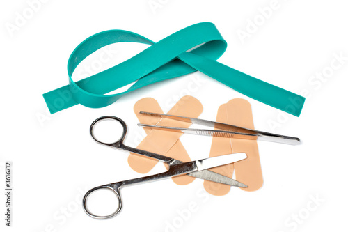 Medical scissors, tweezers and adhesive bandages