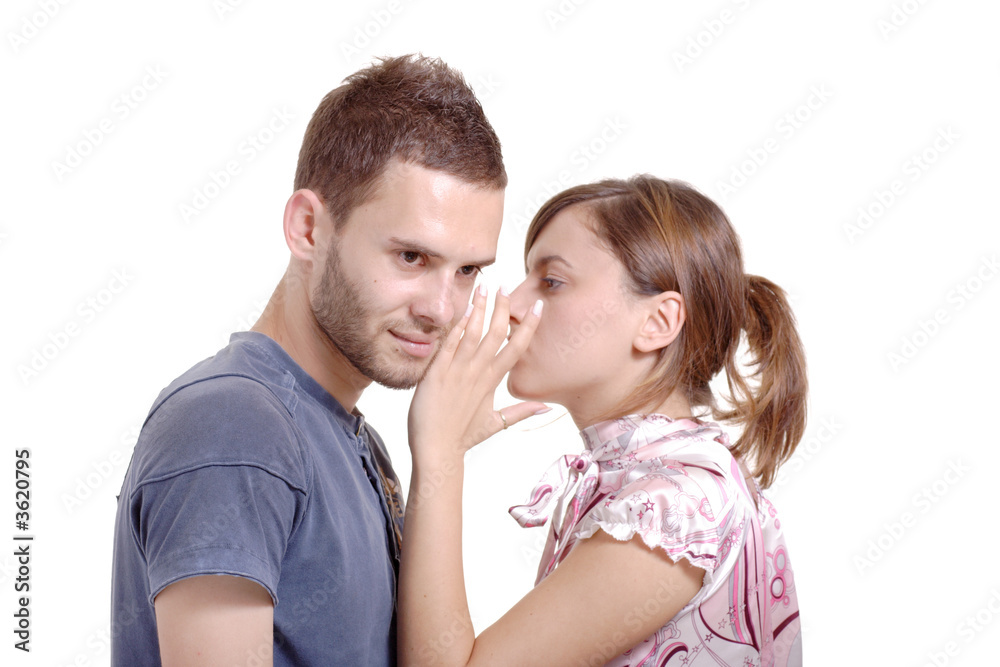Girlfriend talking to a boyfriend against white background Girlfriend talking to a boyfriend against white background