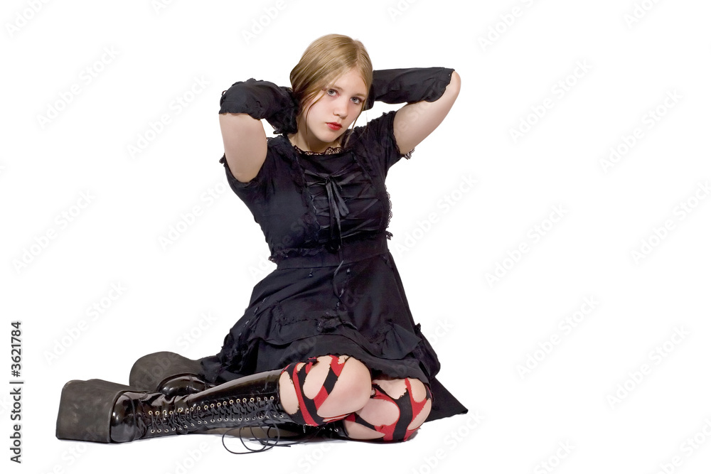 Pretty teen in black dress and boots Pretty teen in black dress and boots