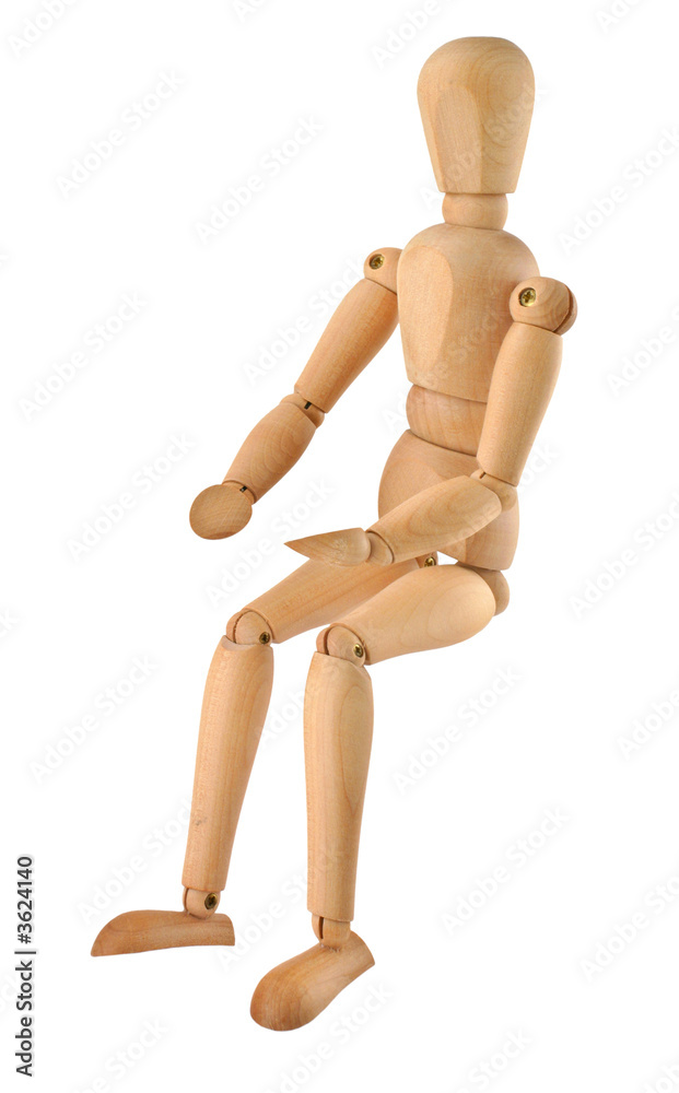 close-up of a sitting wooden figure isolated on white close-up of a sitting wooden figure isolated on white