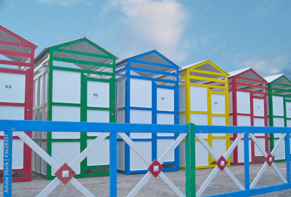 bathing huts St Pol with colourful  painted fence