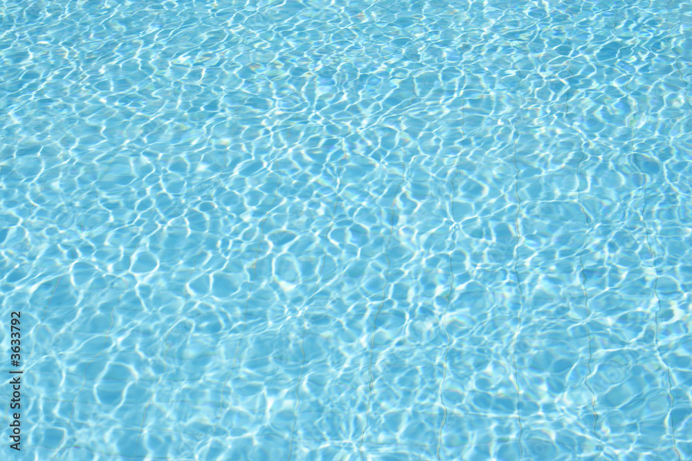 blue water of swimming pool at sunny day