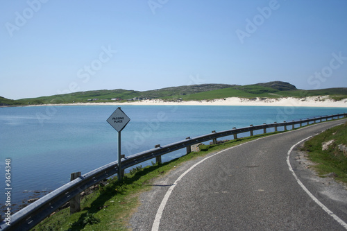 coastal road to white sand beach
