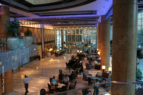 lobby interior with lights with people enjoying