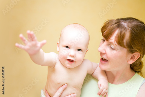 Mother holding enjoying baby #2