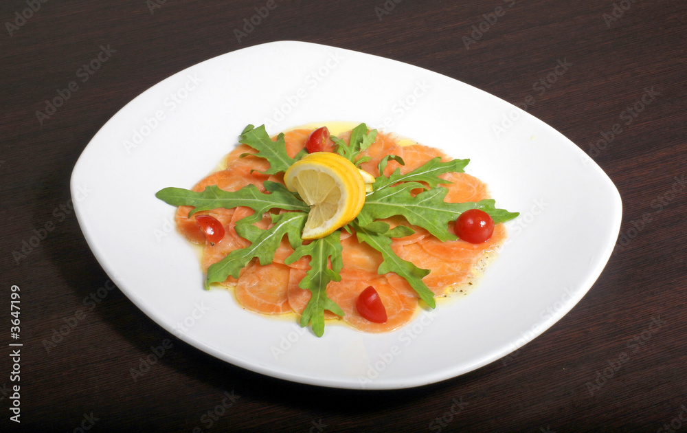 italian dish: carpaccio with salmon and lemon italian dish: carpaccio with salmon and lemon