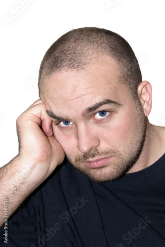 a very sober looking man isolated on white