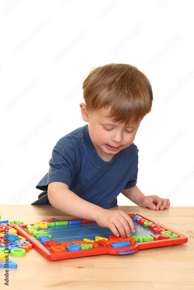 three years old boy and letters isolated on white three years old boy and letters isolated on white