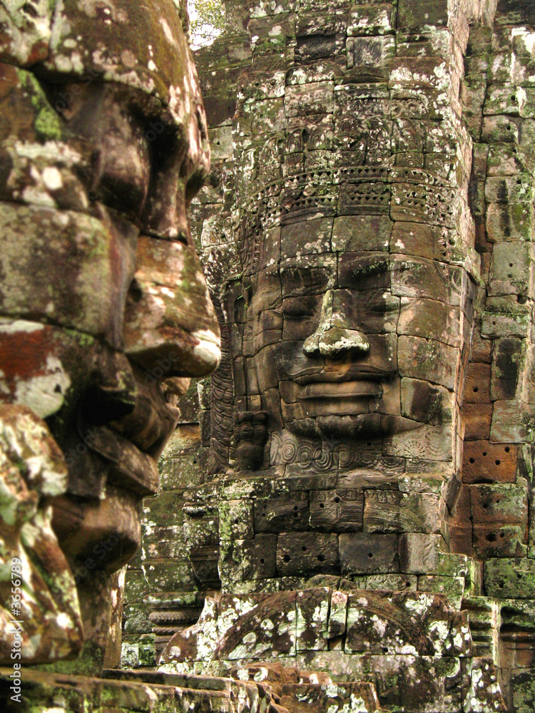 stone faces in the bayan temple, cambodia