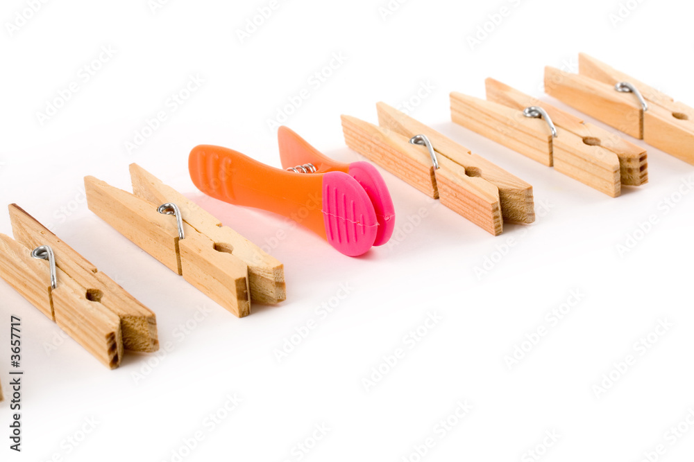 Clothespin with white background, concept of teamwork Clothespin with white background, concept of teamwork