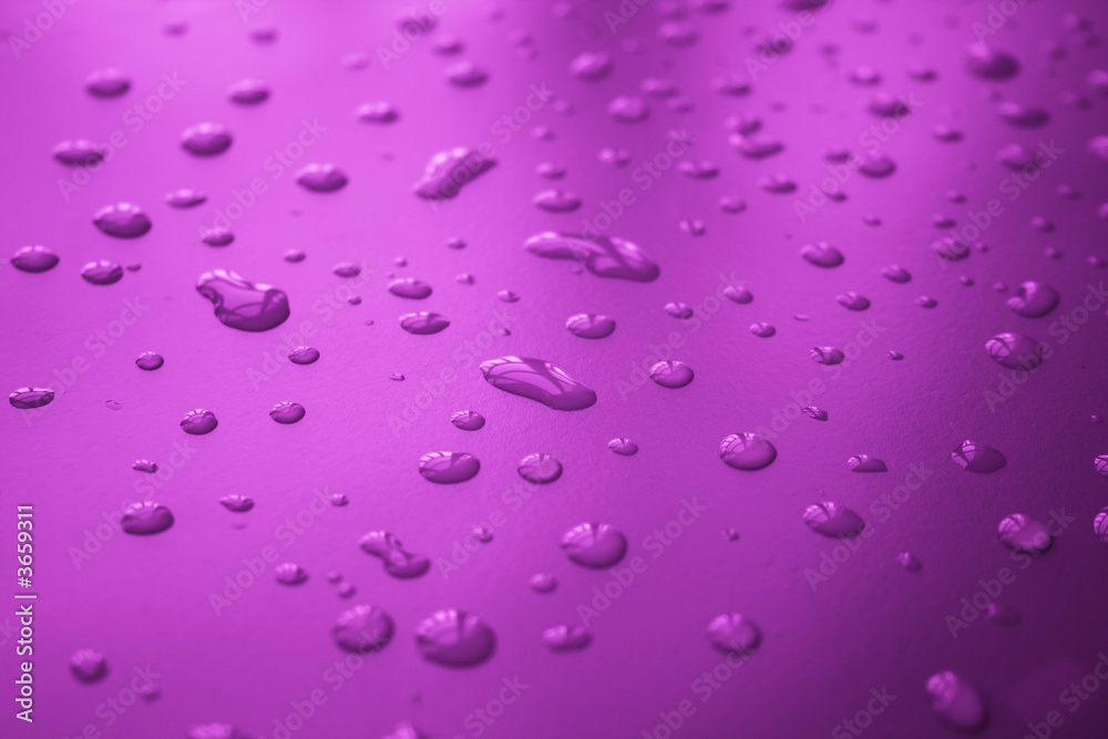 water drop texture in purple background