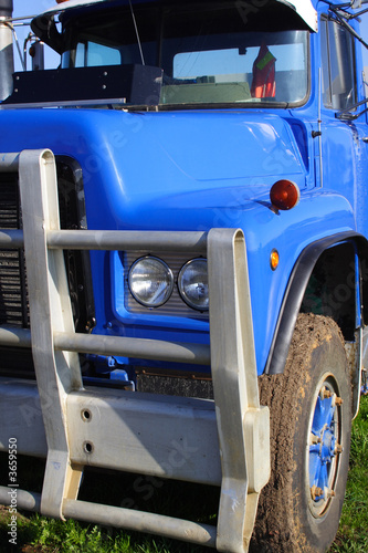 Small blue truck front end