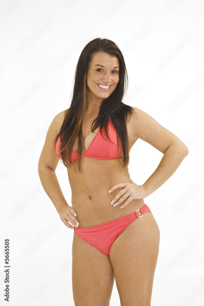 A female caucasian wearing an red bikini. A female caucasian wearing an red bikini.