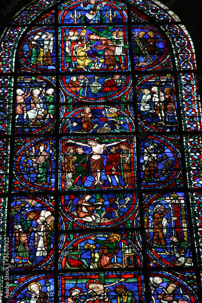 Stained glass window of the crucifixion of Christ in Chartres