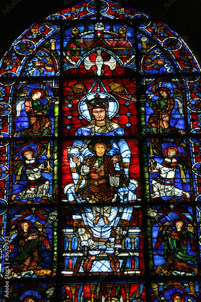 Stained glass window of Virgin Mary in Chartres cathedral