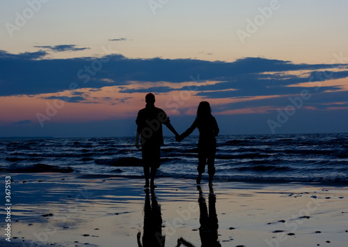 Wallpaper Mural Couple near sea at sunset. Torontodigital.ca
