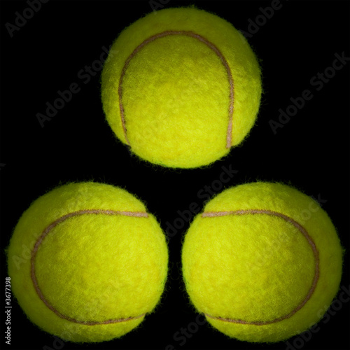 tennis ball on the black background