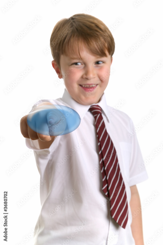 Schoolboy about to press a blank screen button Schoolboy about to press a blank screen button