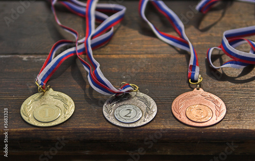 Sporting medals situated on the table