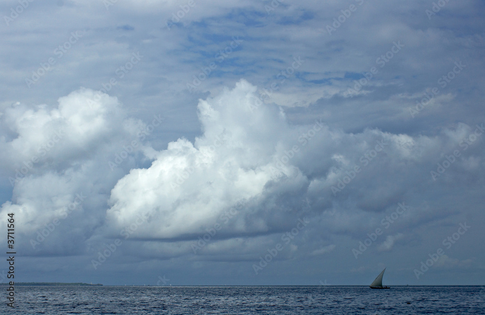 Lonely sailboat in beautiful Indian Ocean. Island Zanzibar.