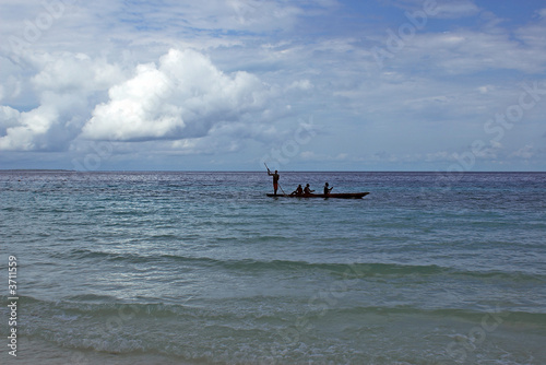 Sailboat with four african fishmen. 