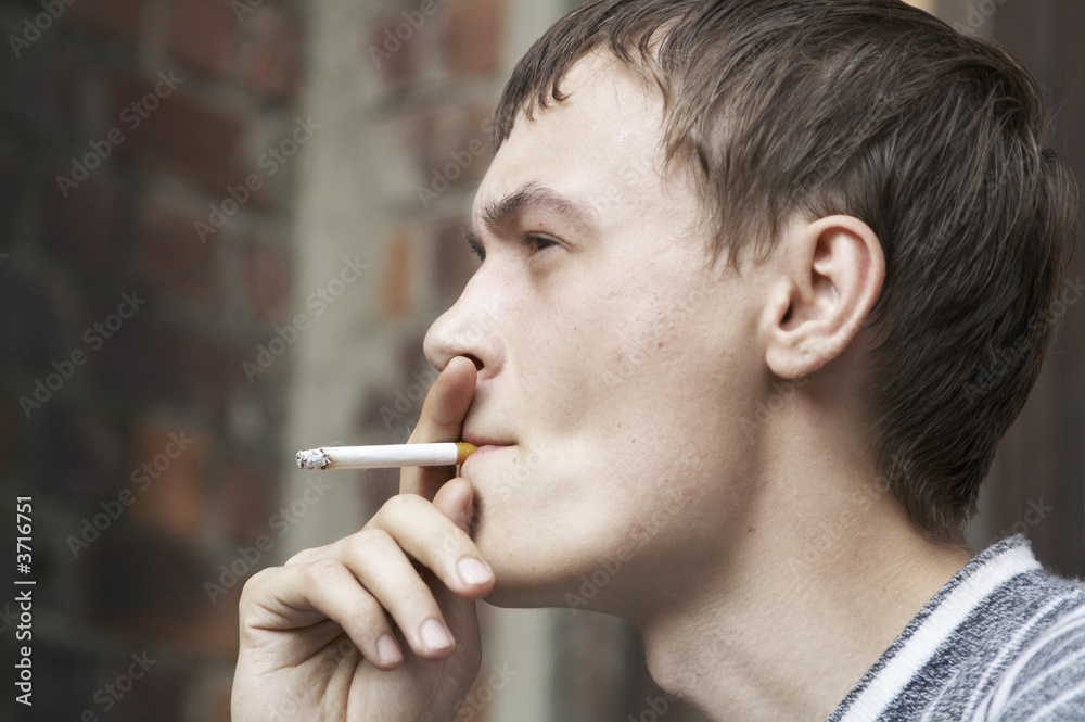 man is smoking the sigarette man is smoking the sigarette