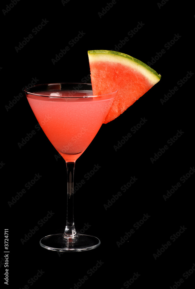 A watermelon martini with a watermelon slice